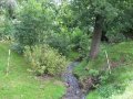 Neregulovaný přítok Červenovodského potoka v obci Červená Voda