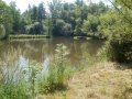 Průtočná vodní nádrž na Gručovickém potoku v obecní části Leskovec, ID: 201010880007