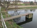 Stavidlo Pivovarského rybníka v obci Hradištko