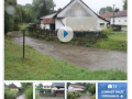 Novinový článek popisující ohrožení obce povodněmi v roce 2014.