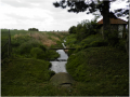 Vyústění zatrubnění potoka Klobúš na konci obce u fotbalového hřiště