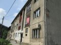 Ohrožené bytové domy v místní části Potůčník