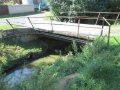 Mostní konstrukce přes účelovou komunikaci (vodní tok Hruškovice) v ř. km 13,505