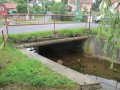 Železobetonová mostní konstrukce na Lomnickém potoce v ř. km 2,54