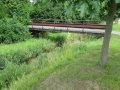 Železná mostní konstrukce před vodní tok Moravskou Sázavu v ř. km 39,2