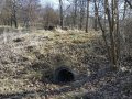 Místo soustředění povrchového odtoku - propustek pod průmyslovým areálem
