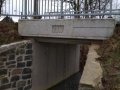 Most z roku 2017 přes Dubnický potok (u č. p. 208) - místo omezující odtokové poměry