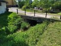 Mostní konstrukce při soutoku vodních toků v Komárovicích - dochází ke zpětnému vzdouvání vody