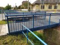 Mostní konstrukce přes hlavní komunikaci č. 35 s pěšími lávkami se nachází v záplavovém území řeky Bečvy Q100