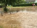 Povodeň 2019 - zatopení lávky pro pěší, která spojuje části obce přes Šumici